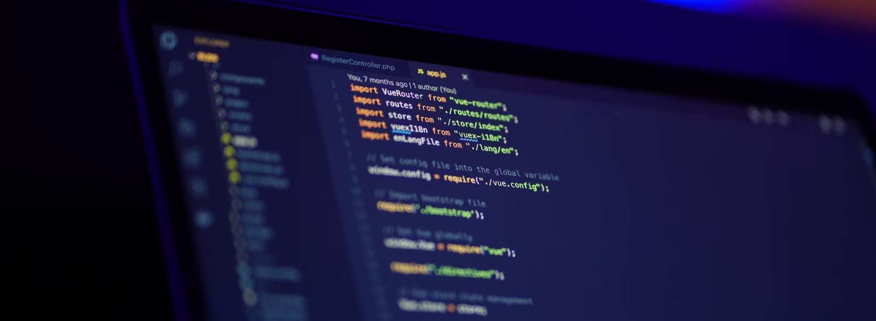 A computer monitor showing snippets of code.